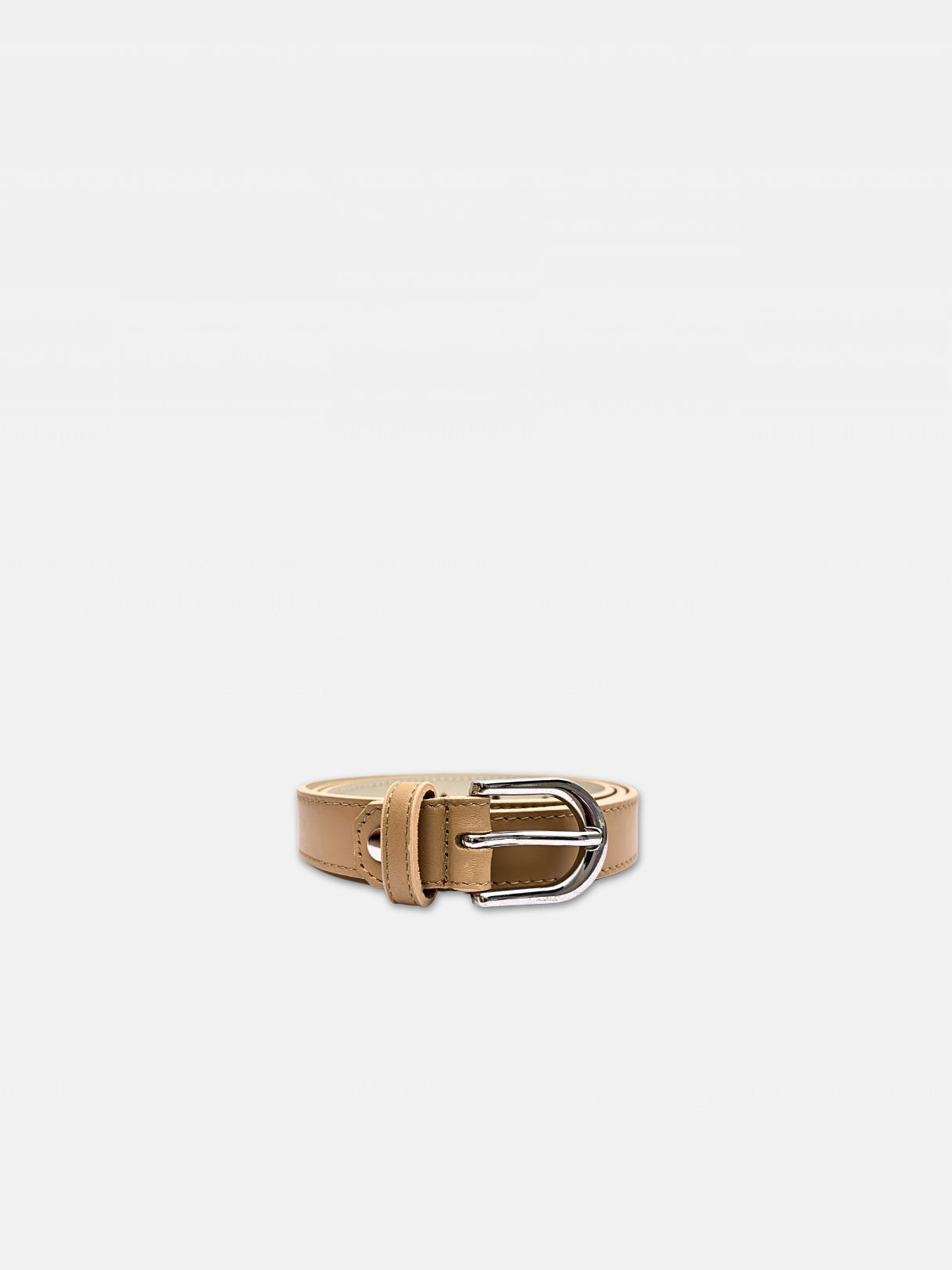 Ceinture en cuir beige aurore de 25 millimètre avec boucle arrondie argentée, vue roulée ouverte